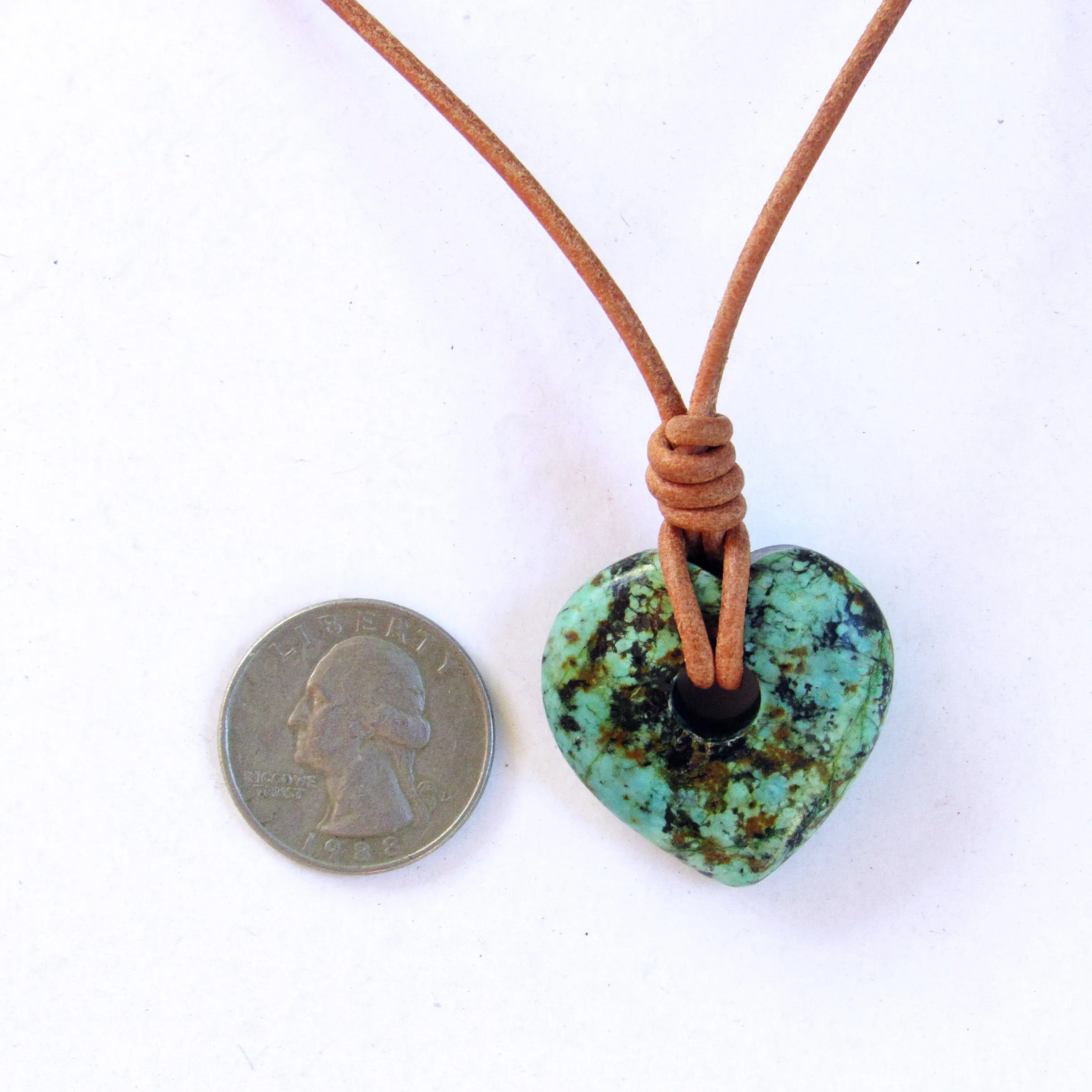 African Turquoise gemstone heart on natural leather with copper clasp