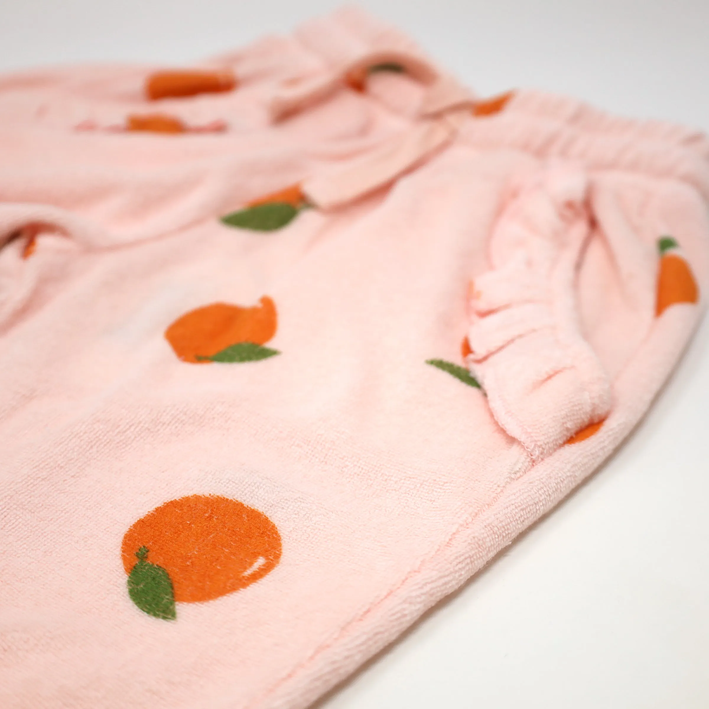 oh baby! Cotton Terry Ruffle Pocket Jogger - Oranges Print - Pale Pink